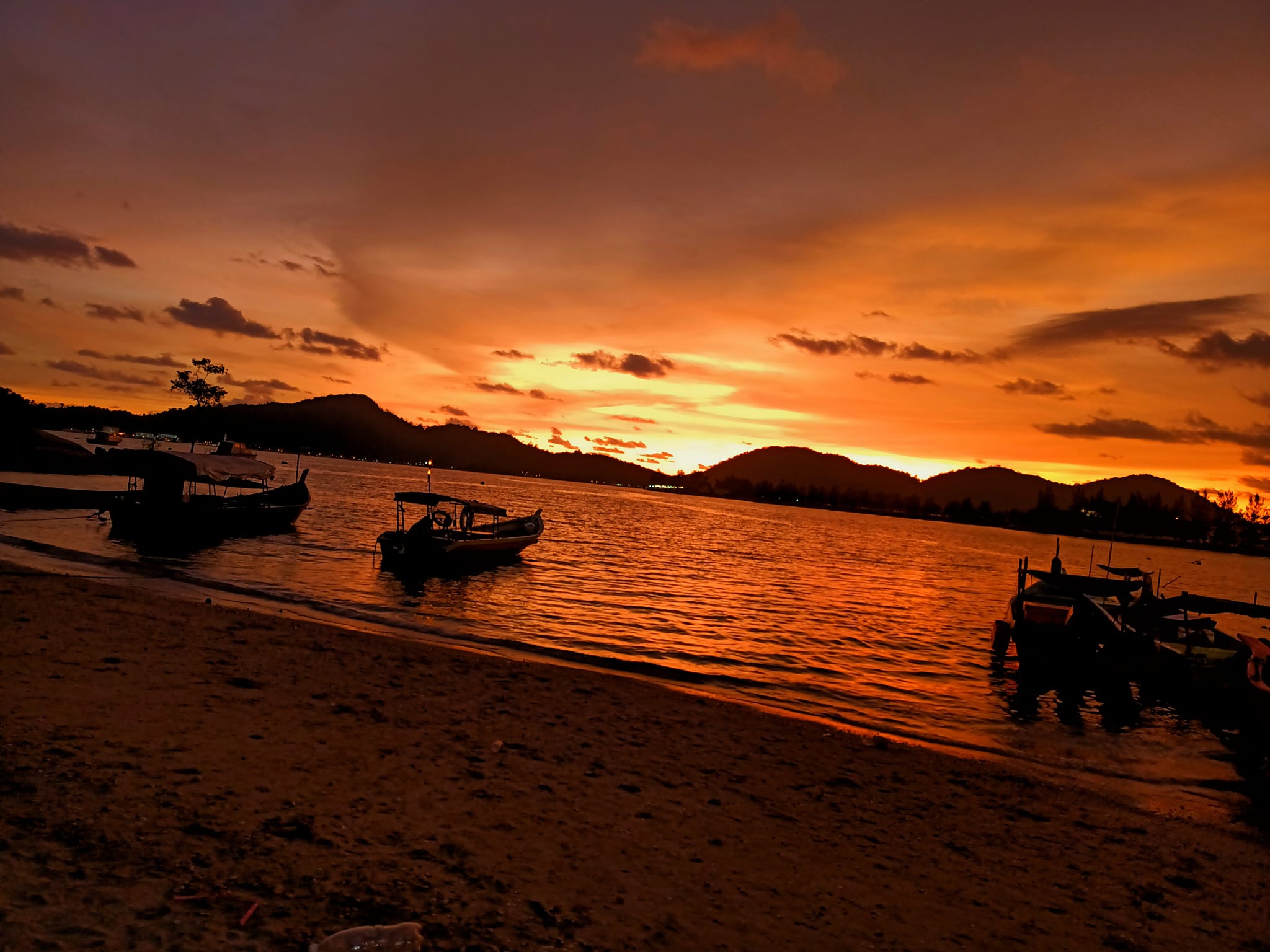 Wooden boats at Sunset